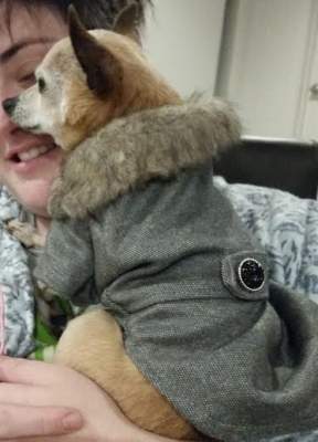 Pearly-Sue in the arms of her Mum, loving her forever home.  (Monday, 1st of June 2015)