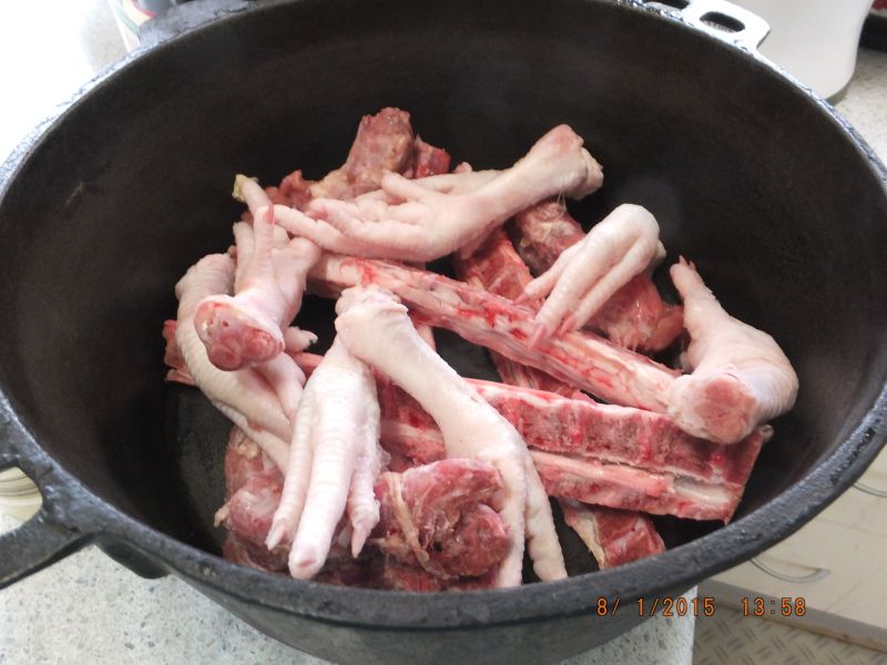 Fill your pot up to three quarters full with the bones.