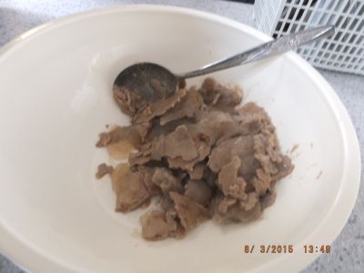 Put the pot on a lit stove top and bring to boil on high for ten minutes. Remove any scum with a large spoon and discard.